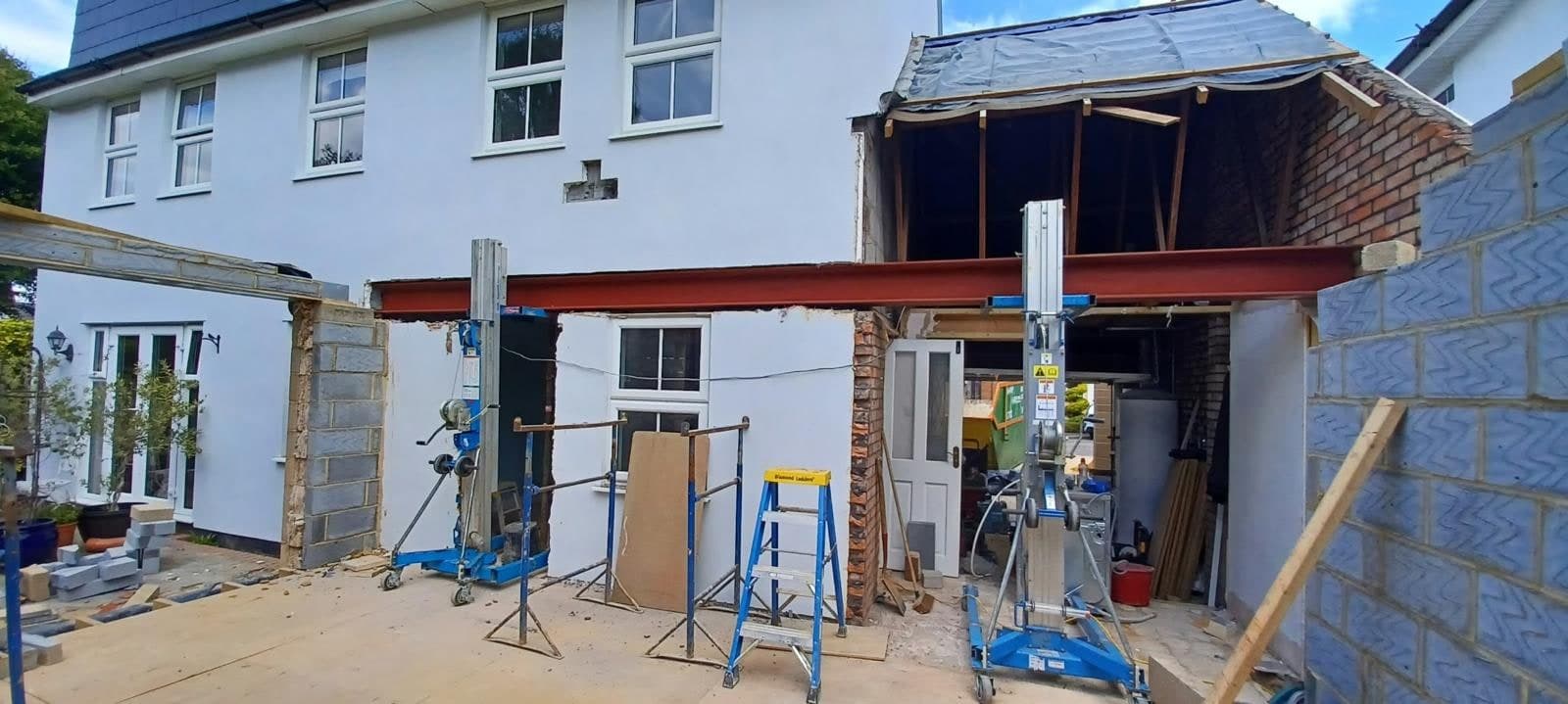 Original rear wall propped ready for the opening to be formed
