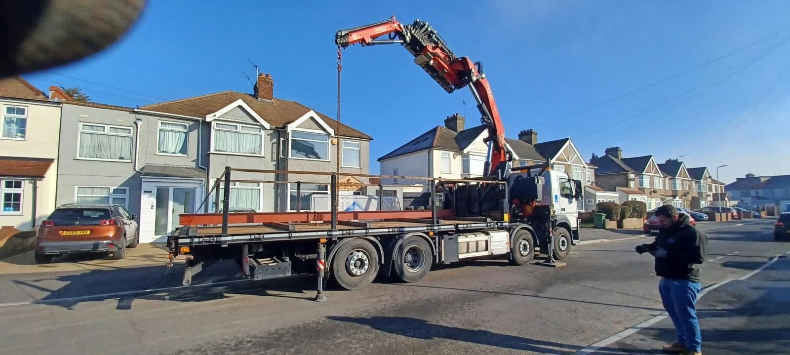 Steel delivery arriving on a crane lorry