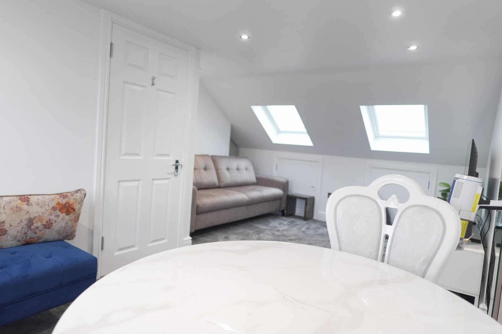 Loft room with rooflights and sloping ceiling