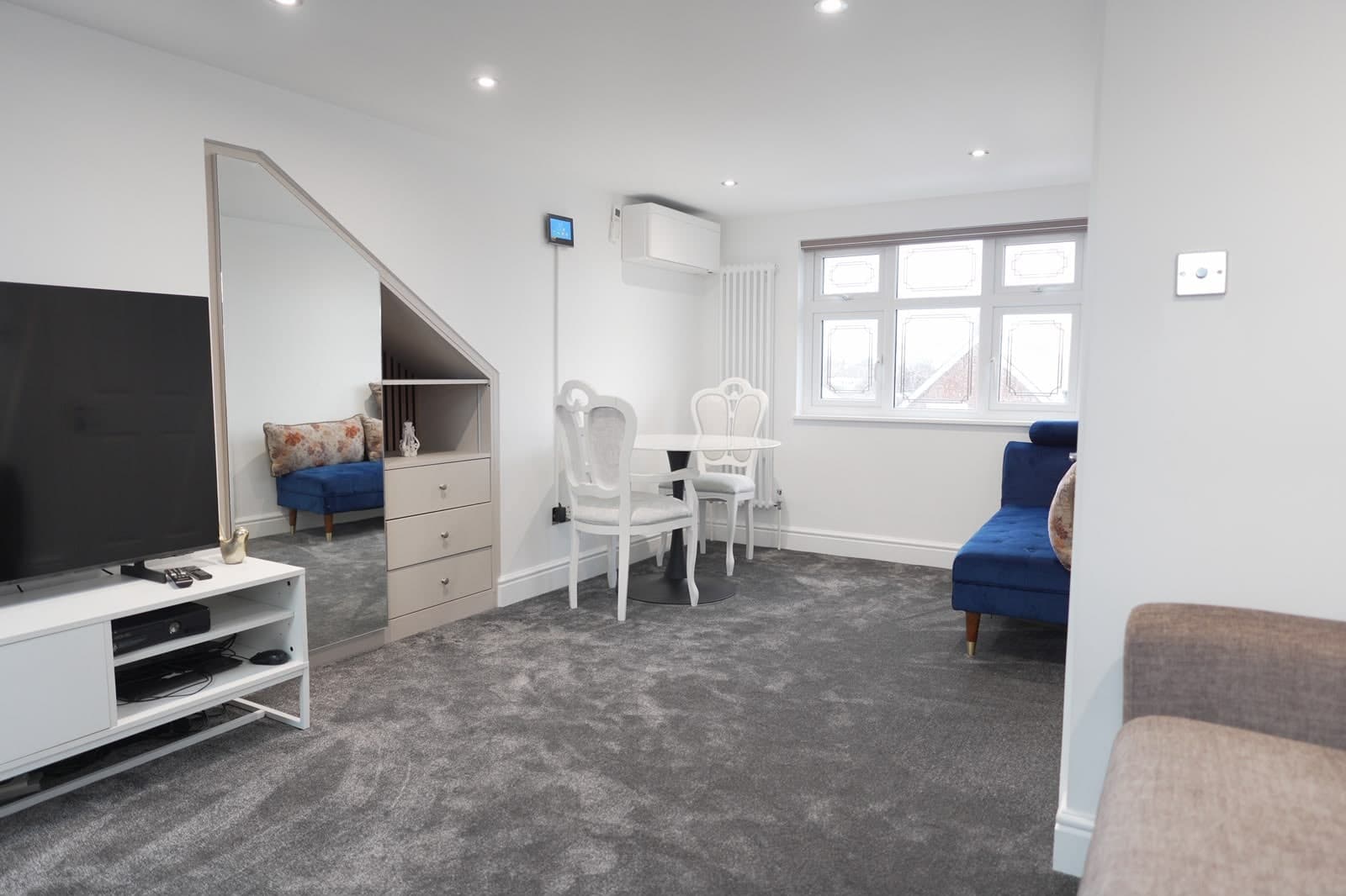 Loft room with eaves storage and dormer window