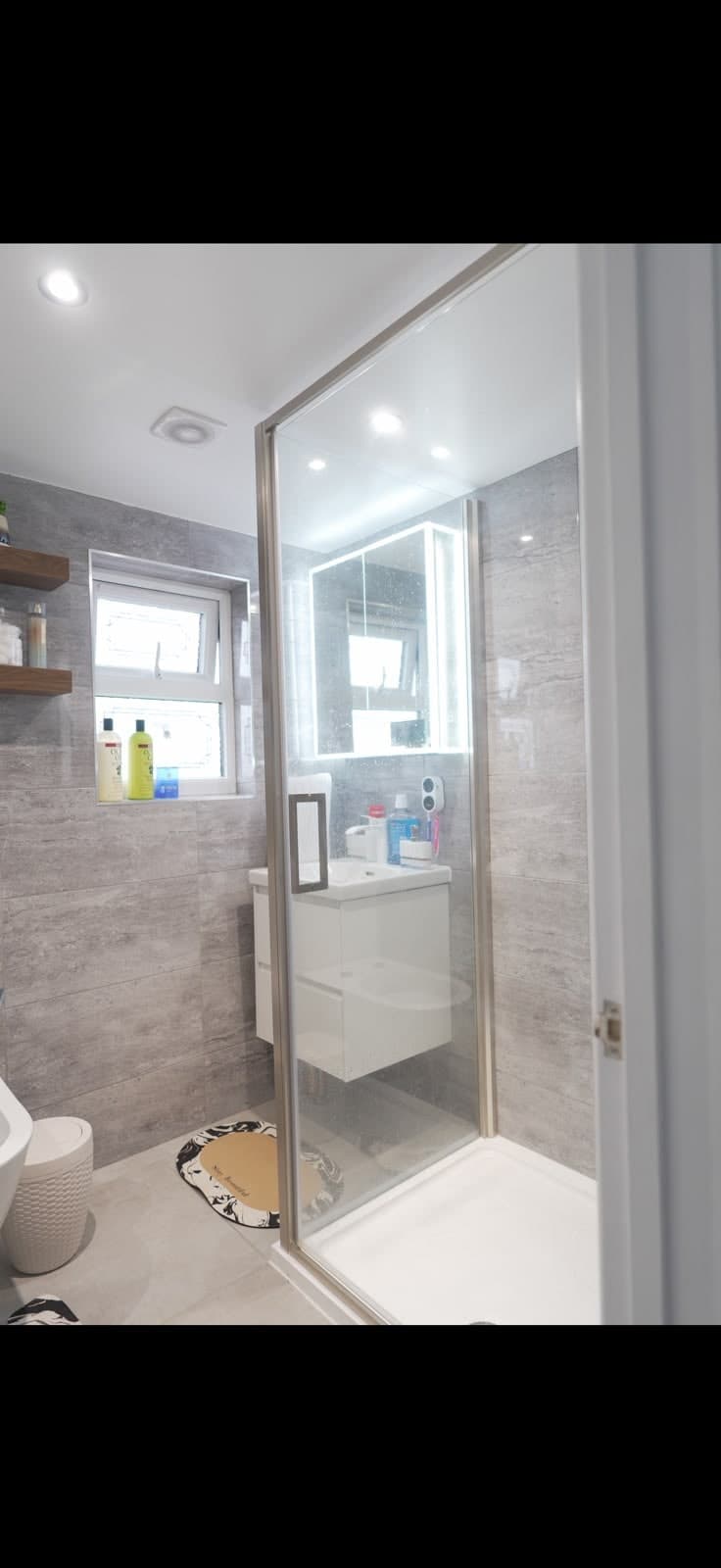 Loft en-suite with vanity unit and shower