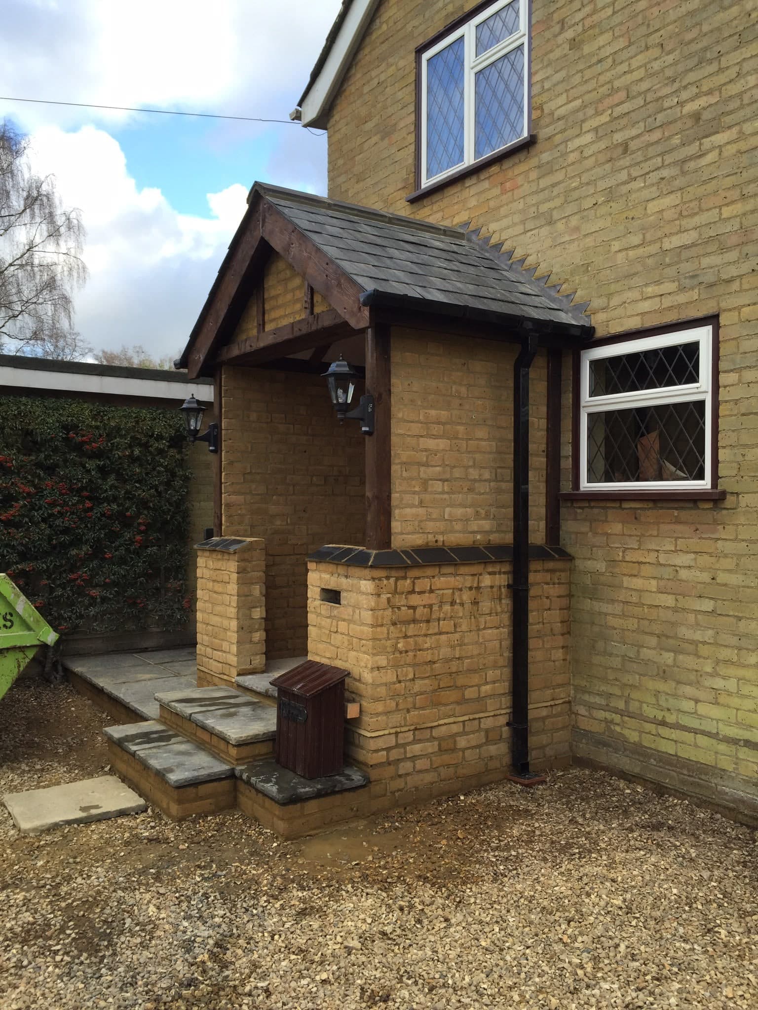 Brick porch with oak canopy and new front step