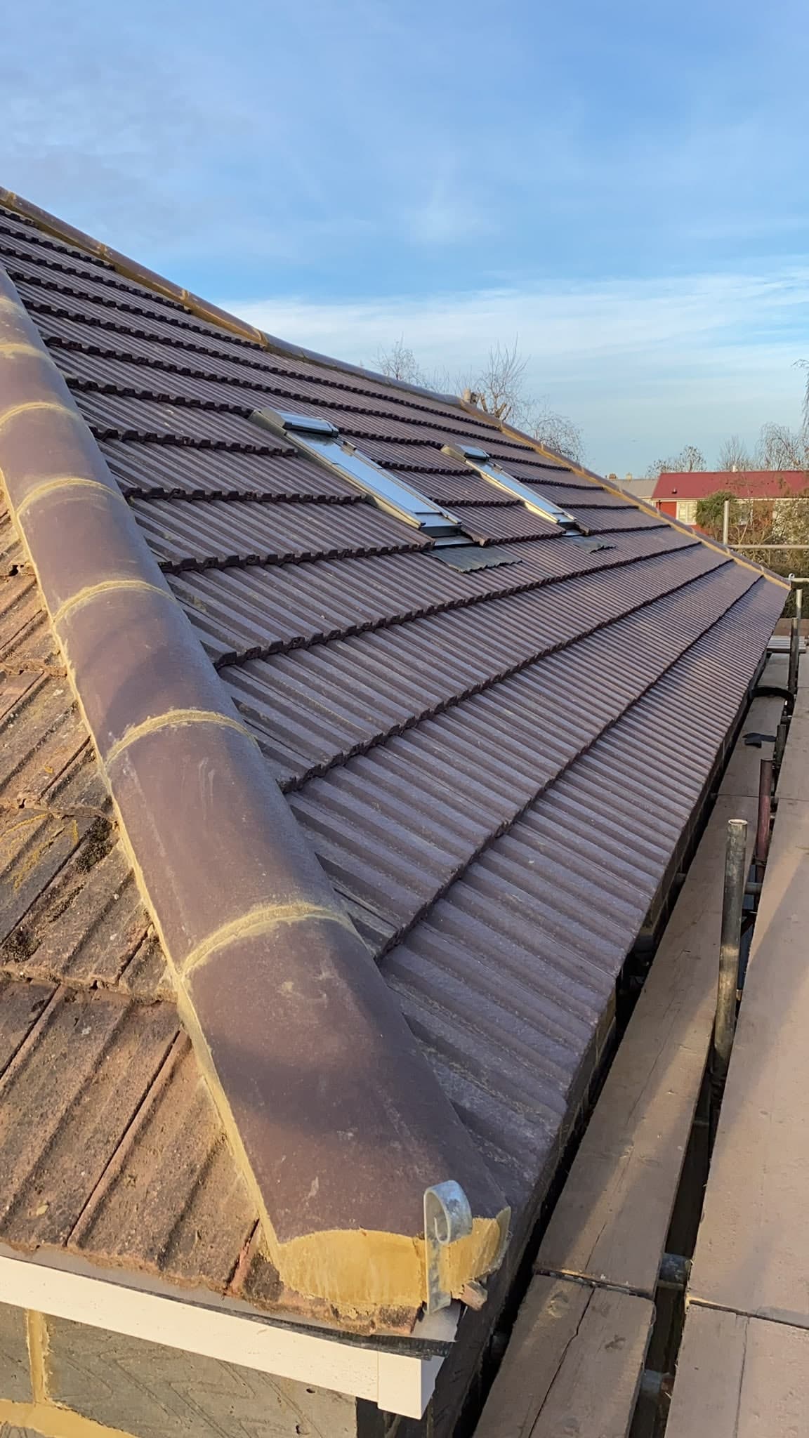 New tiled roof with ridge tiles